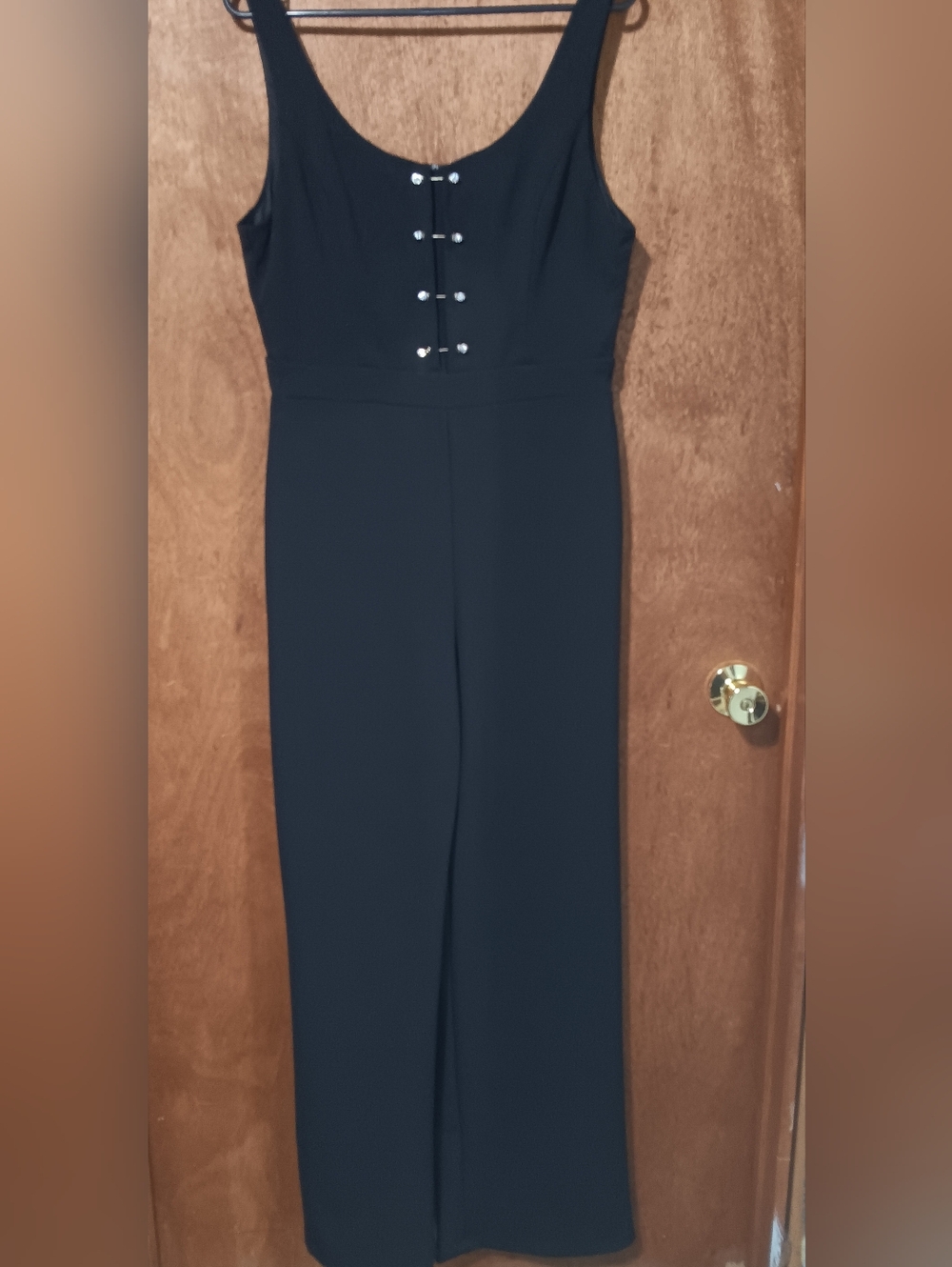 Sleeveless Black Jumpsuit with Decorative Front Buttons